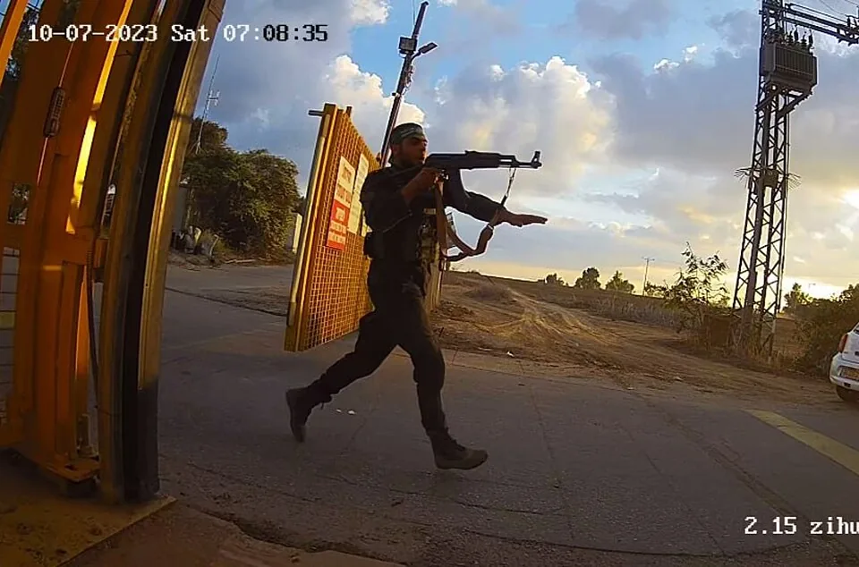 Hamas gunman entering a kibbutz in southern Israel on October 7, 2023