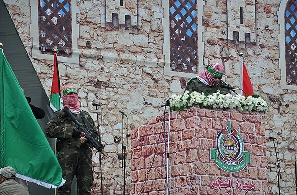 Armed Hamas members at a Hamas anniversary event