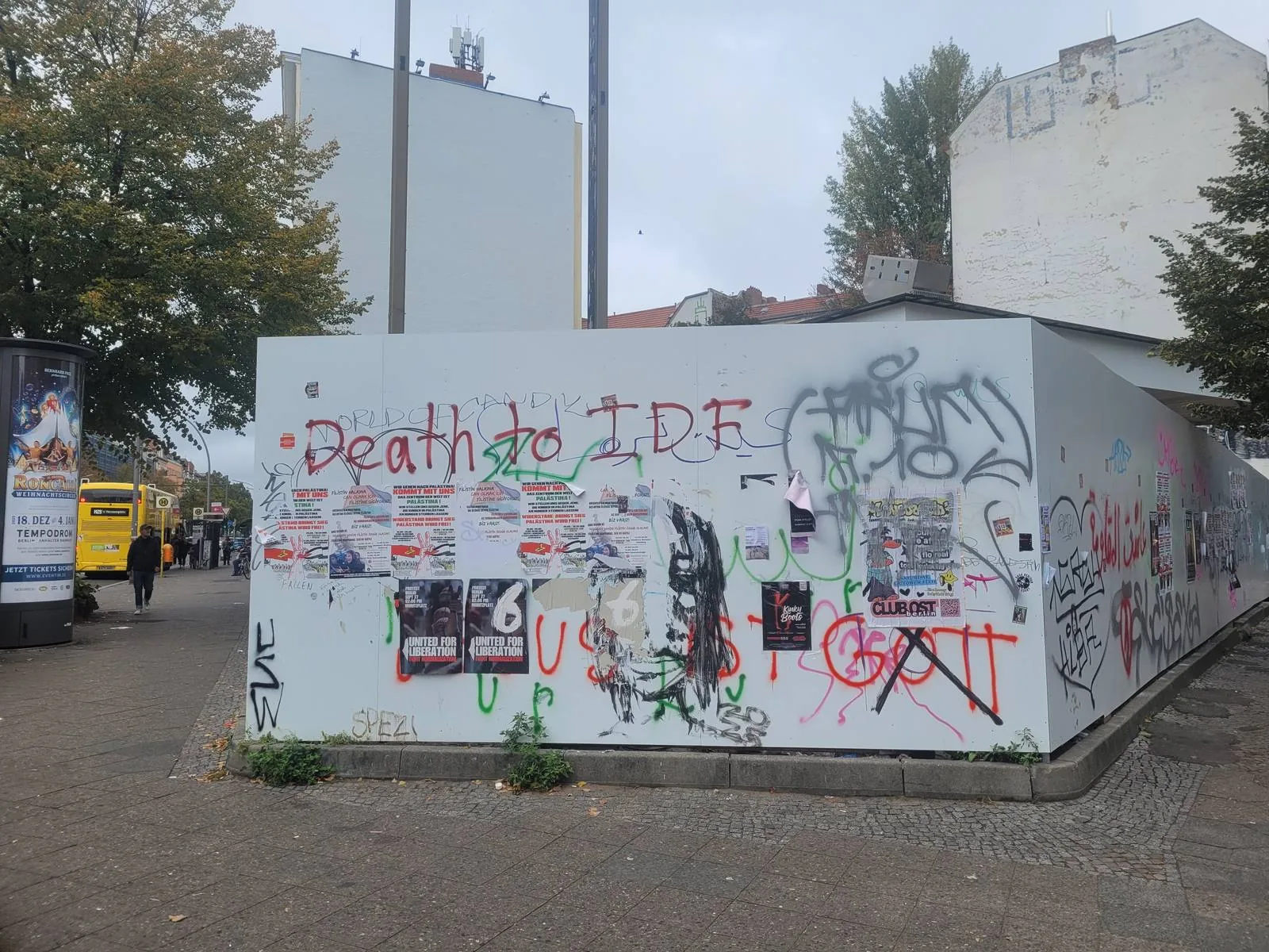 Death to the IDF graffiti and protest posters